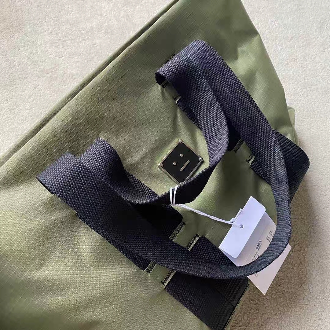 Acne studios arvid plaque face tote bag sale