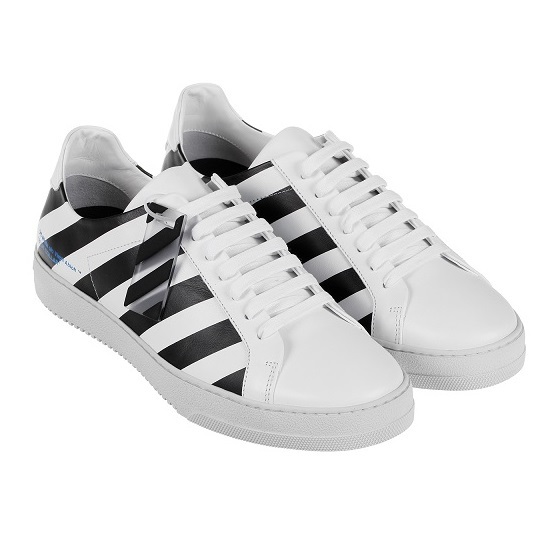 black sneakers with white stripes