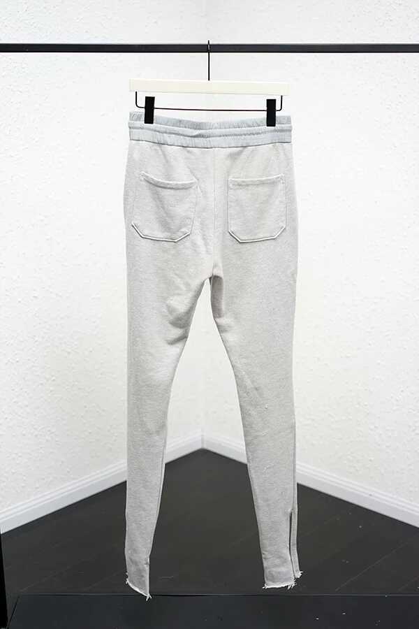 distressed track pants