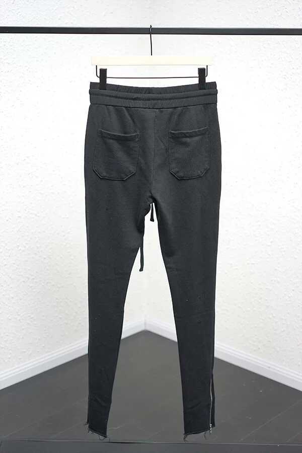distressed track pants