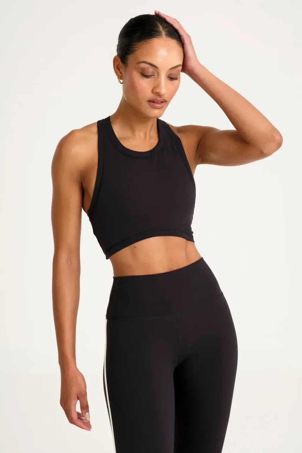 A4C187_BLK_CloudCore_HighNeckLongLineSportsBra_Lifestyle1