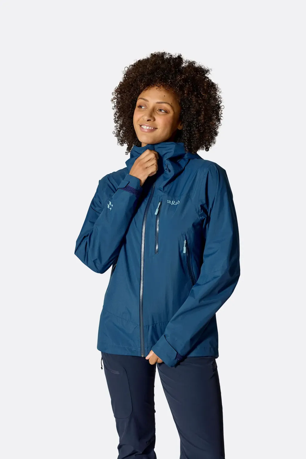 womens_downpour_mountain_jacket_tempestblue_qwi_12_tmb_model_5354