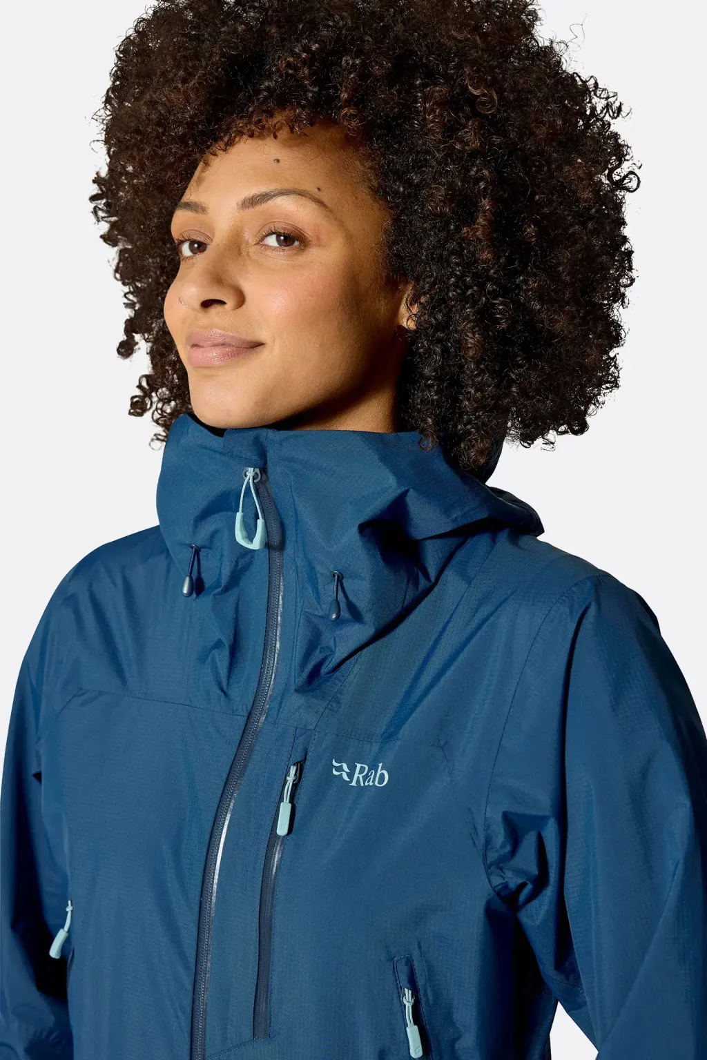 womens_downpour_mountain_jacket_tempestblue_qwi_12_tmb_model_5378
