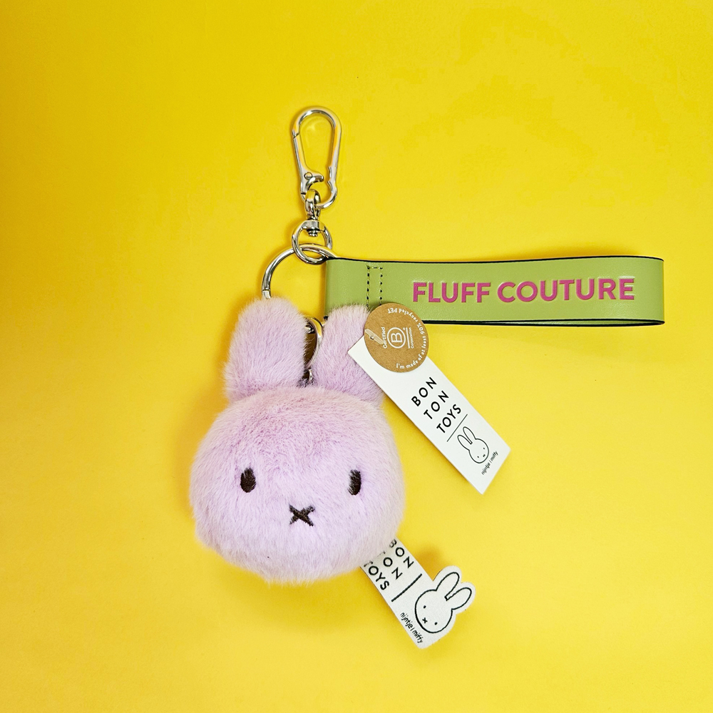 24205104-ECO Fuzzy Lilac Bag Charm-1