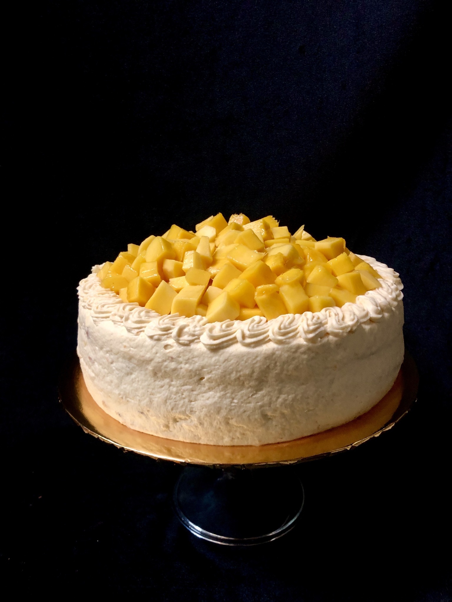 Mango Chiffon Cake with Whipped Mango Cream Frosting - The Unlikely Baker®