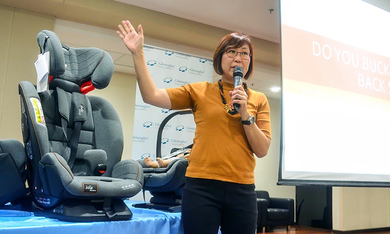 May Hwong conducting a Car Seat Safety talk