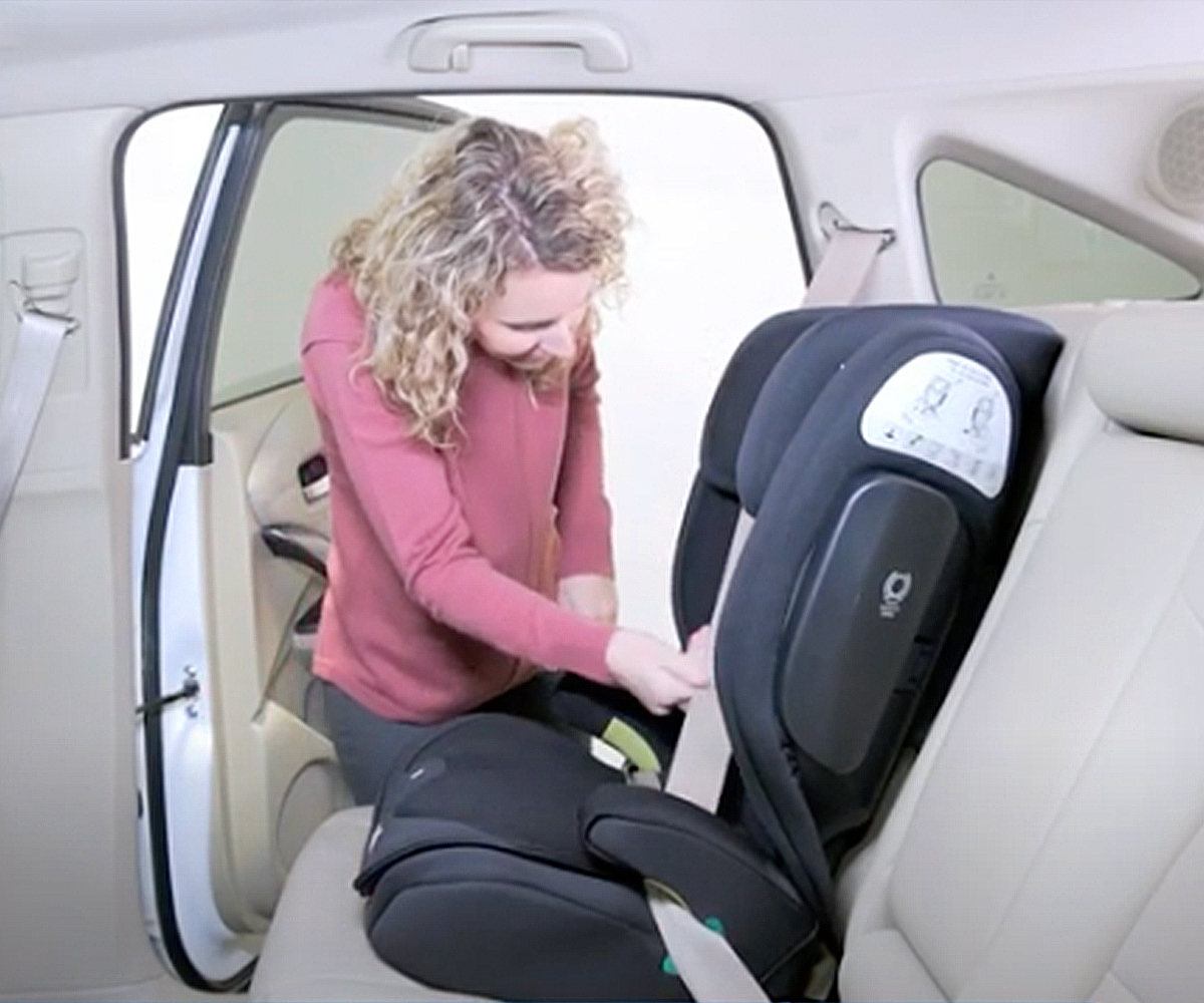 Empty booster seat buckled on the vehicle seat.jpg