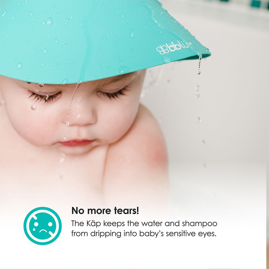 B0109_-_KAP_-_Feature_-_baby_with_cap_on_head_and_water_dropping