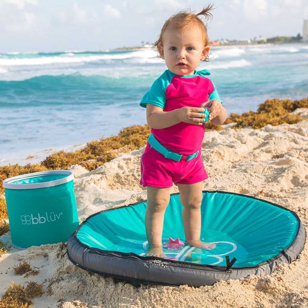 B0129 - SPLASH - Lifestyle - Girl standing in pool 