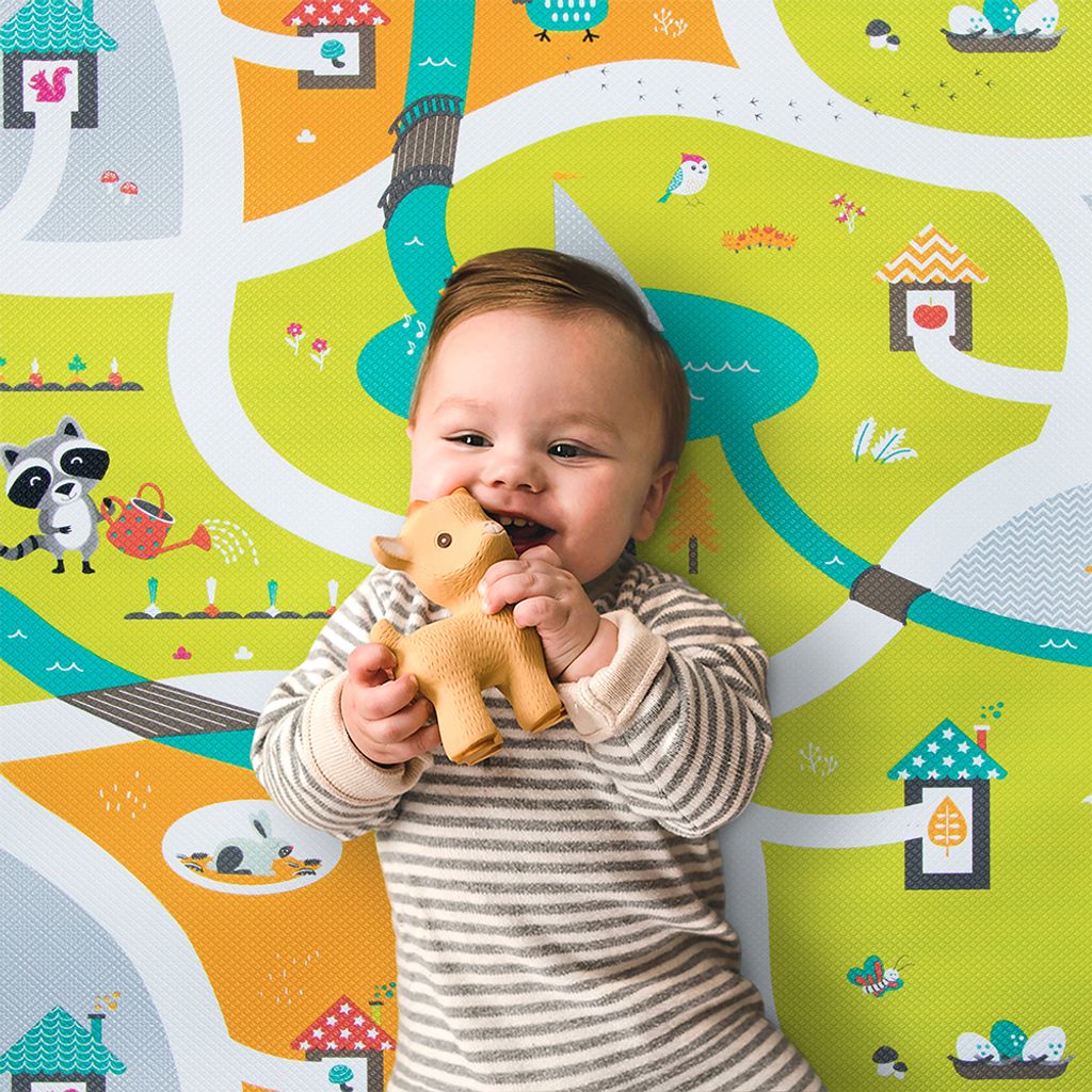 B0173_-_MULTI_-_Lifestyle_-_Boy_smiling_holding_toy