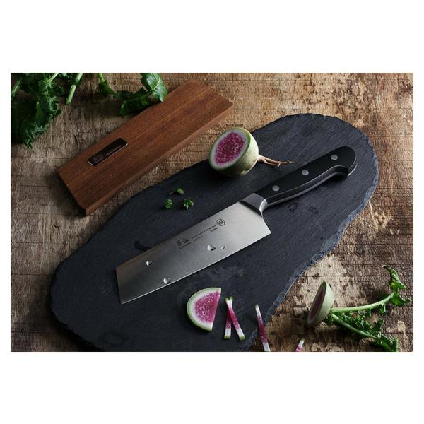 nakiri knife on cutting board