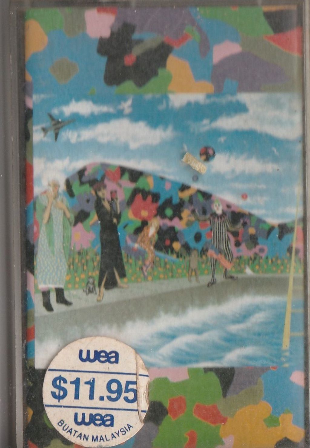 PRINCE AND THE REVOLUTION Around The World In A Day CASSETTE.jpg