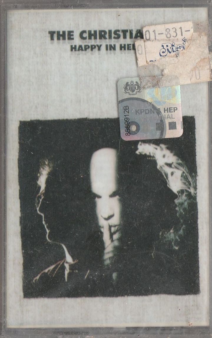 THE CHRISTIANS Happy In Hell CASSETTE.jpg