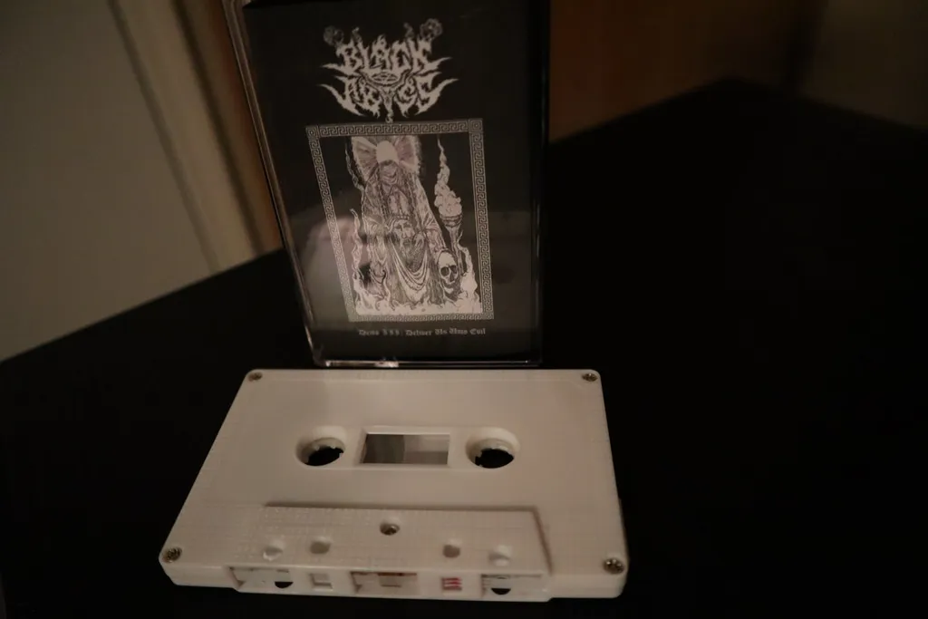 BLACK ABYSS Deliver Us Unto Evil CASSETTE.jpg