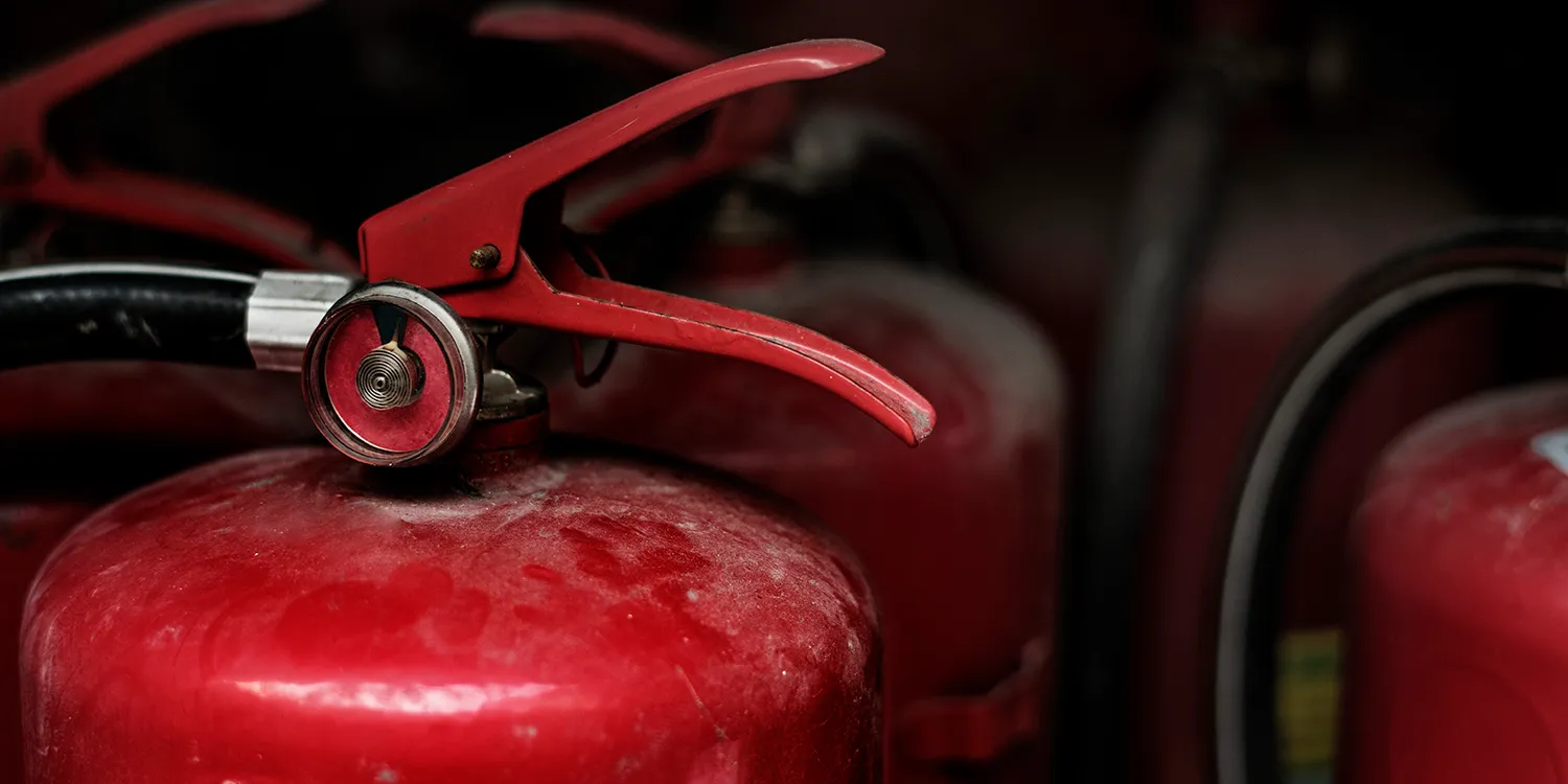 closeup-red-fire-extinguishers