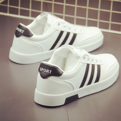 white shoes with three black stripes