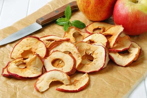 Dehydrated-sliced-apple-rings-on-parchment-paper.jpg