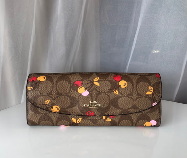 COACH SLIM WALLET IN SIGNATURE CANVAS WITH CHERRY PRINT (COACH F31562)