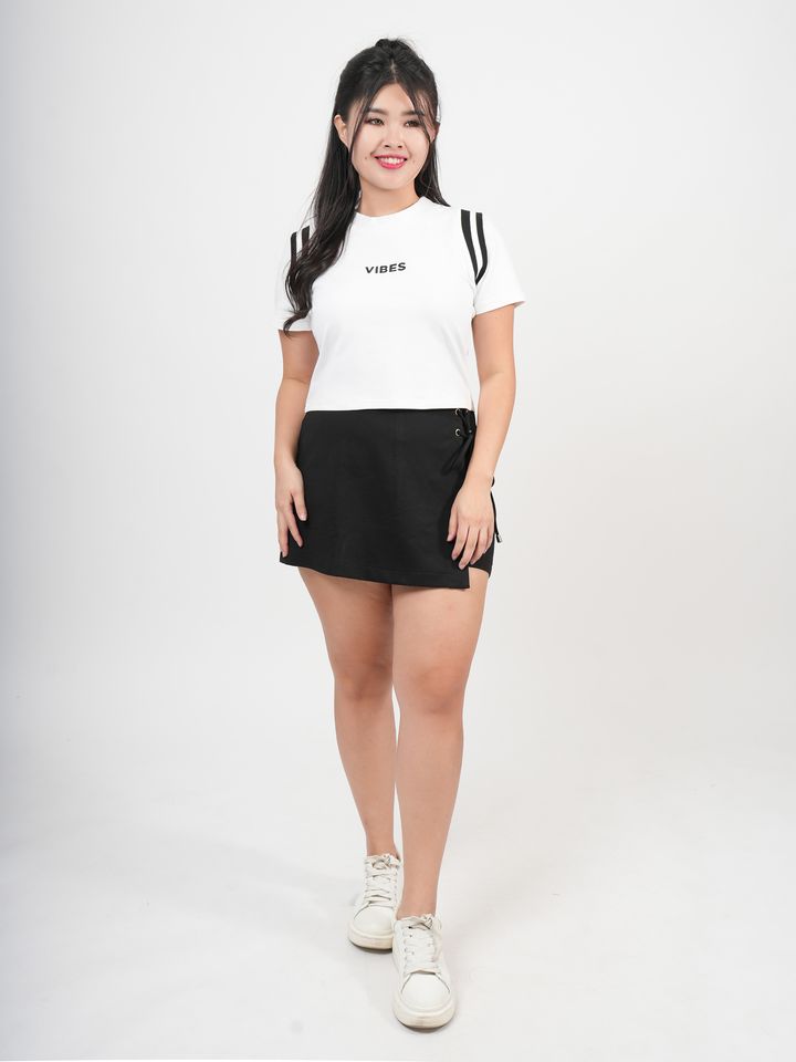 Black and white short-sleeve T-shirts featuring varsity-style stripe detail.