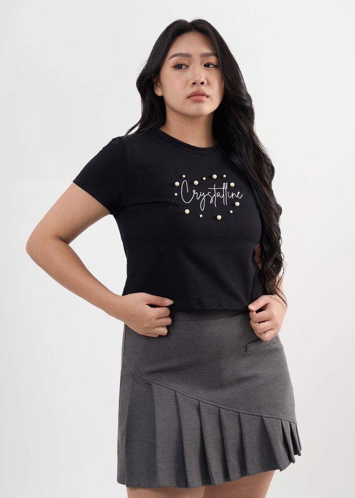 Plus-size beaded graphic tee with delicate pearl-like embellishments.