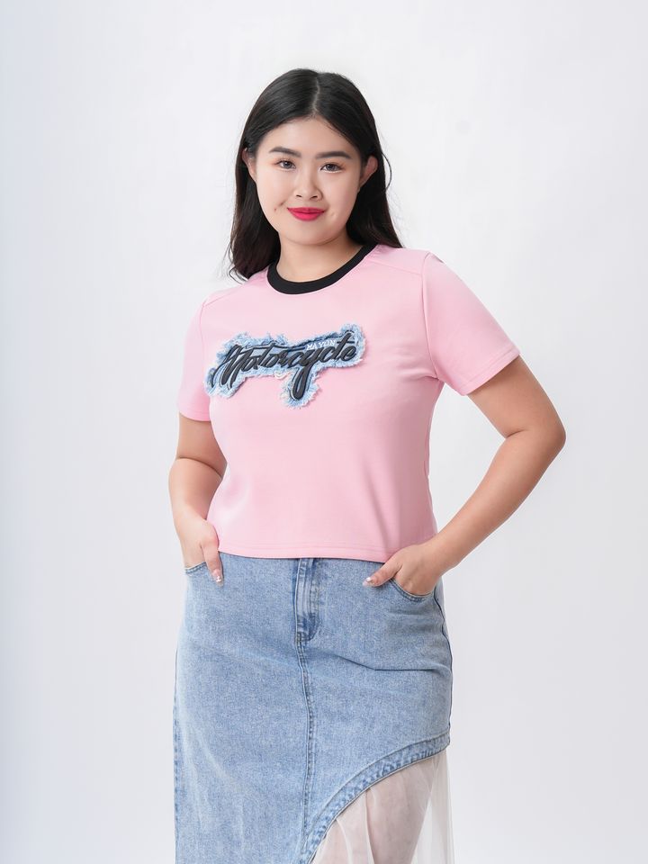 Youth Vibe Graphic Tee – playful plus-size T-shirt with bold, youthful print.