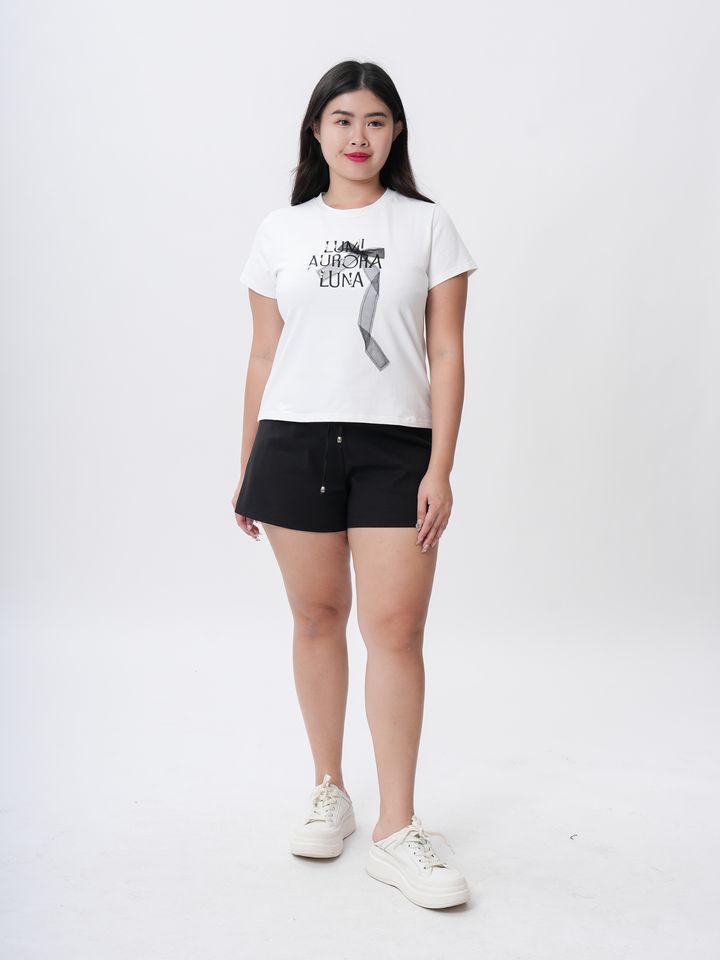 Lunar Aura Graphic Tee – features “LUMI AURORA LUNA” typography and a 3D ribbon detail.