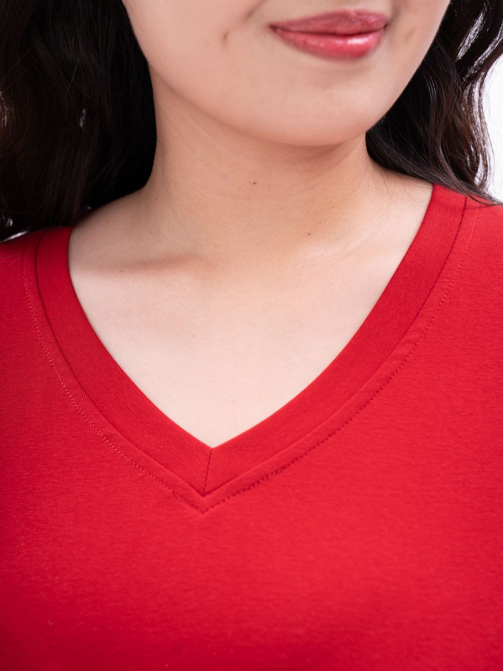 Essential V-neck tee tailored to enhance plus-size proportions.
