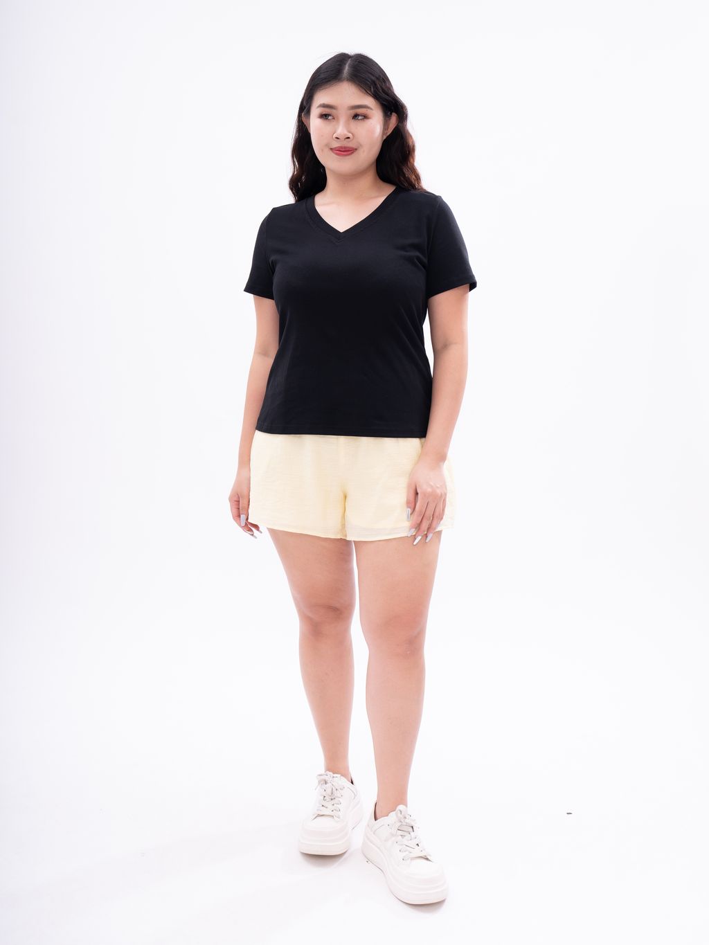 Basic plus-size T-shirt featuring a slimming V-neck design.