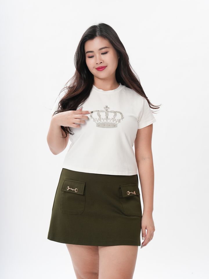Elegant plus-size tee designed for curves, featuring a polished, jewel-toned style.