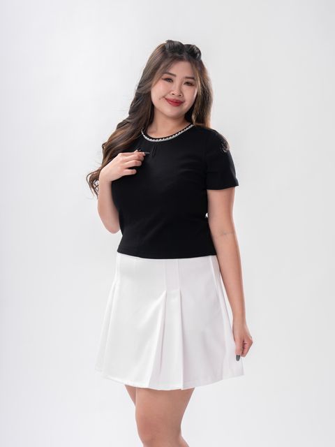 Elegant plus size top with pearl-line accents for a touch of delicate charm.