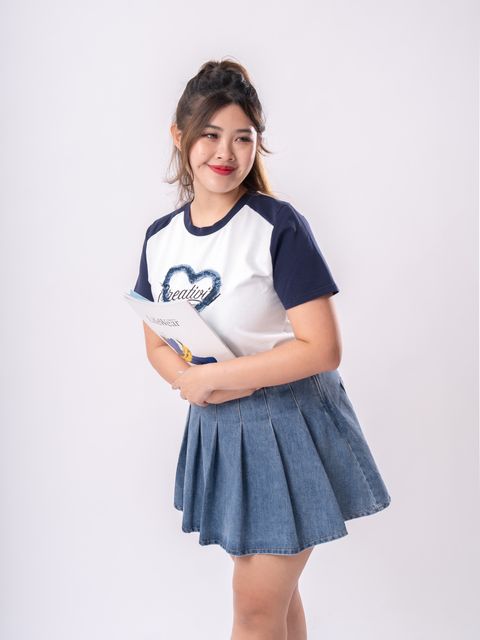 Creative heart-accented top with raw-edge finish, designed for curvy comfort and flair.