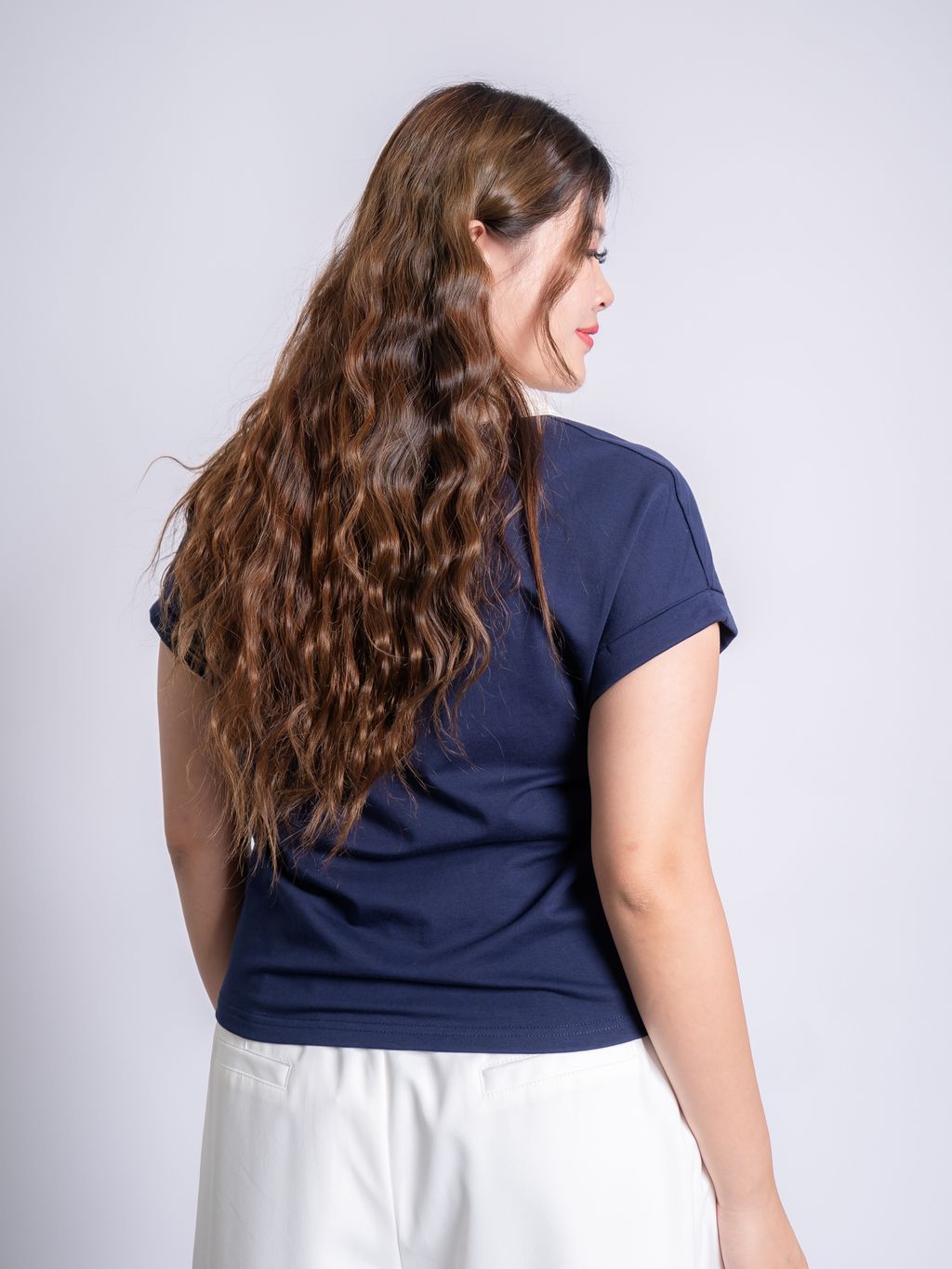 Chic zip polo tee designed for fuller figures, balancing comfort and fashion.