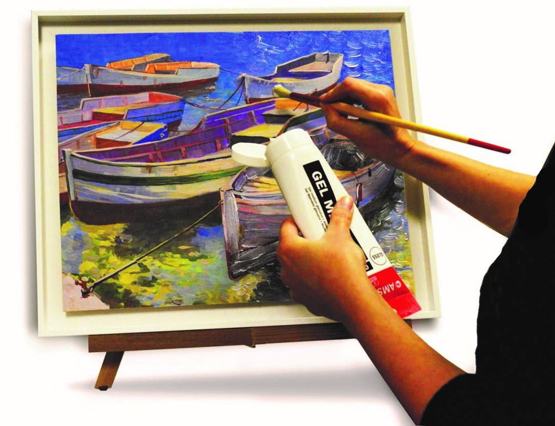 Applying texturizing gel to canvas print