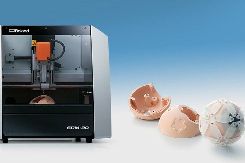 Roland SRM-20 compact milling machine with milled parts