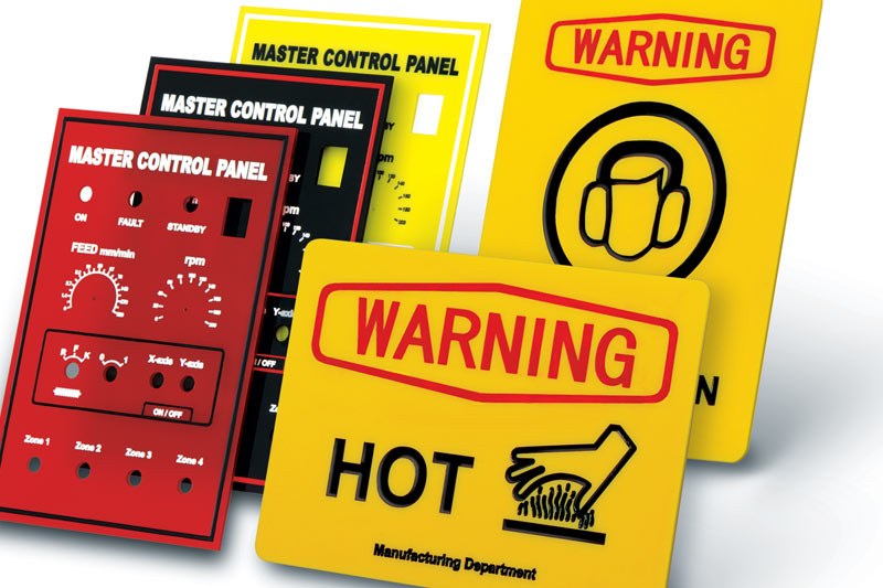 Engraved control panels and warning signs