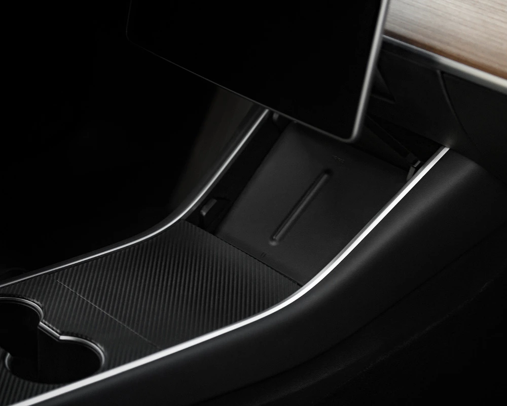Tesla Model 3 charger seamlessly fitting in the console