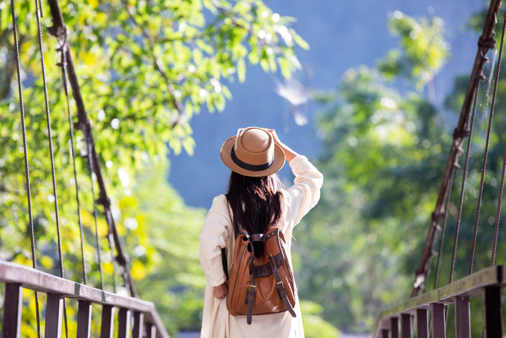 female-tourists-spread-their-arms-held-their-wings