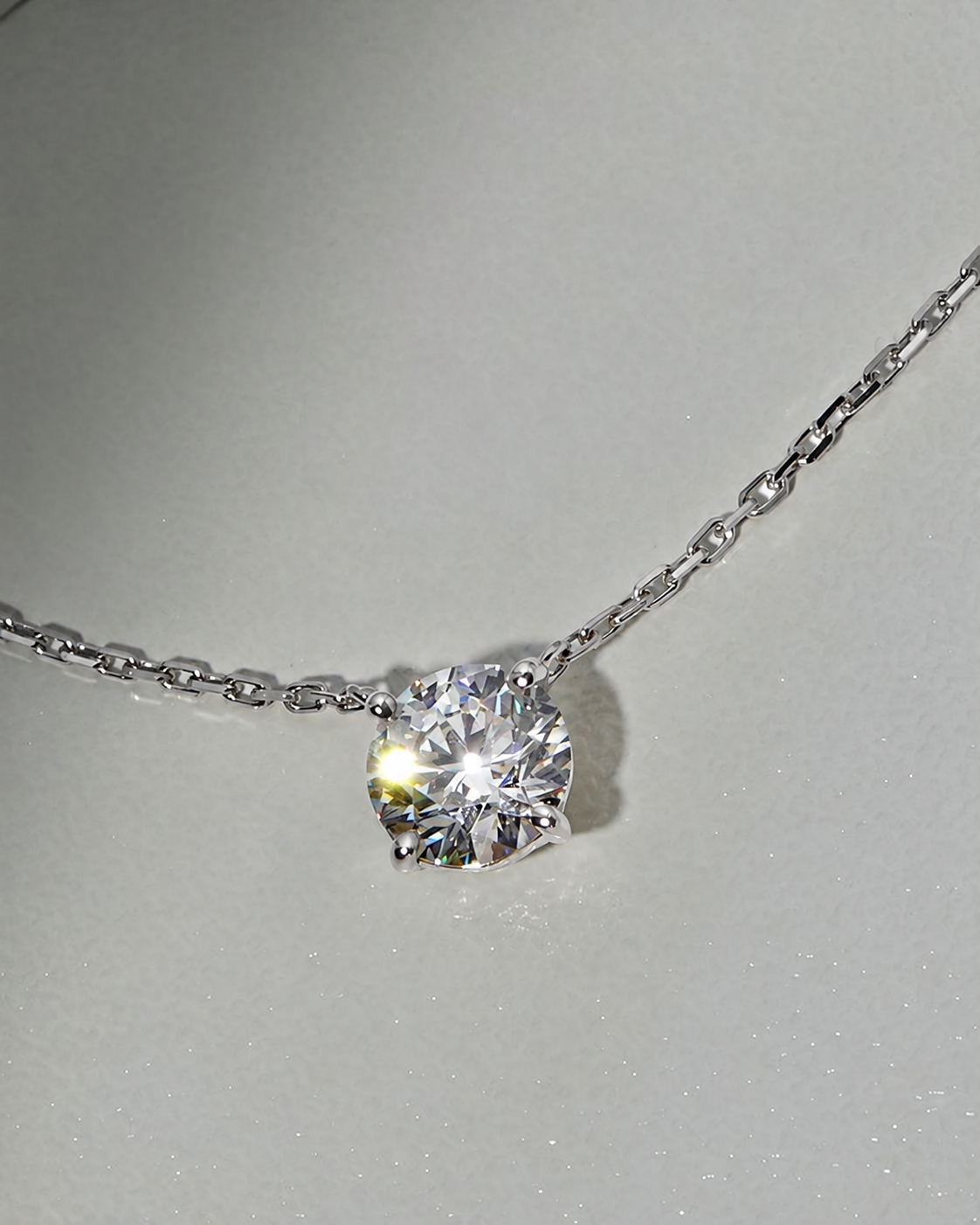 White gold necklace with rainbow gemstone