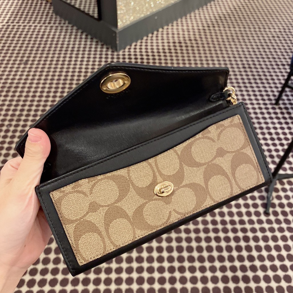 slim envelope wallet with chain in blocked signature canvas