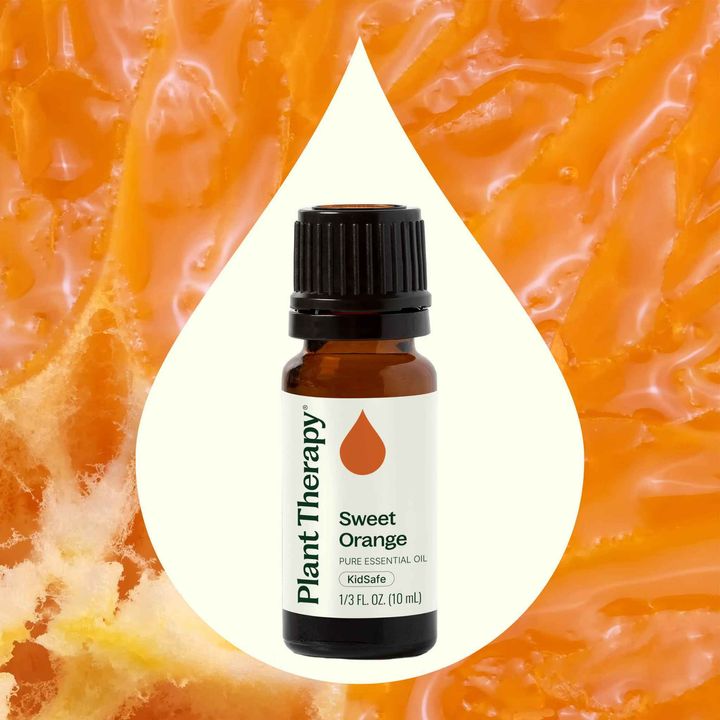 Sweet Orange Essential Oil diffused to create an uplifting and cheerful atmosphere