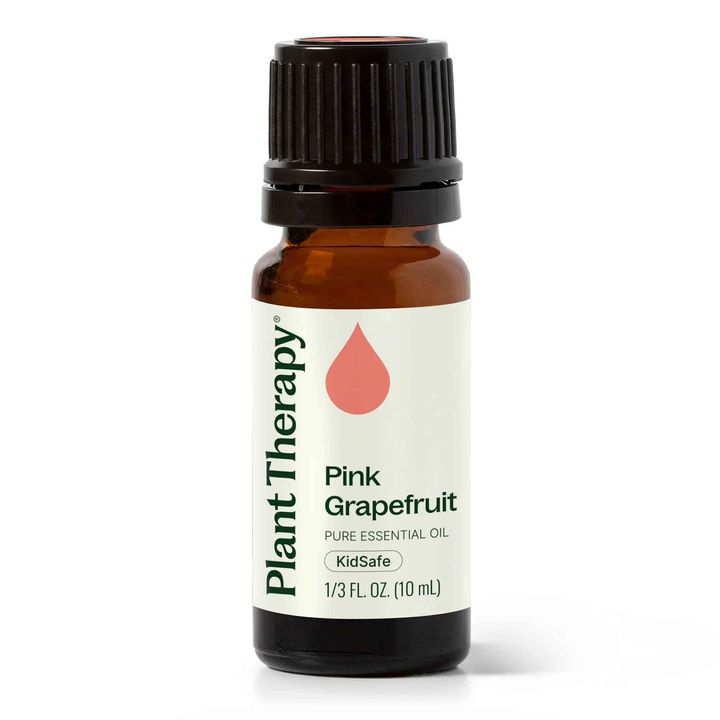 Plant Therapy Pink Grapefruit Essential Oil bottle with bright citrus aroma