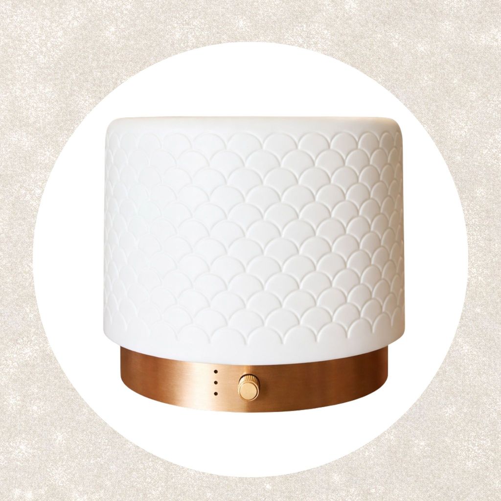 Ceramic Buba-Pro diffuser with textured finish and gold metal base for elegant home décor