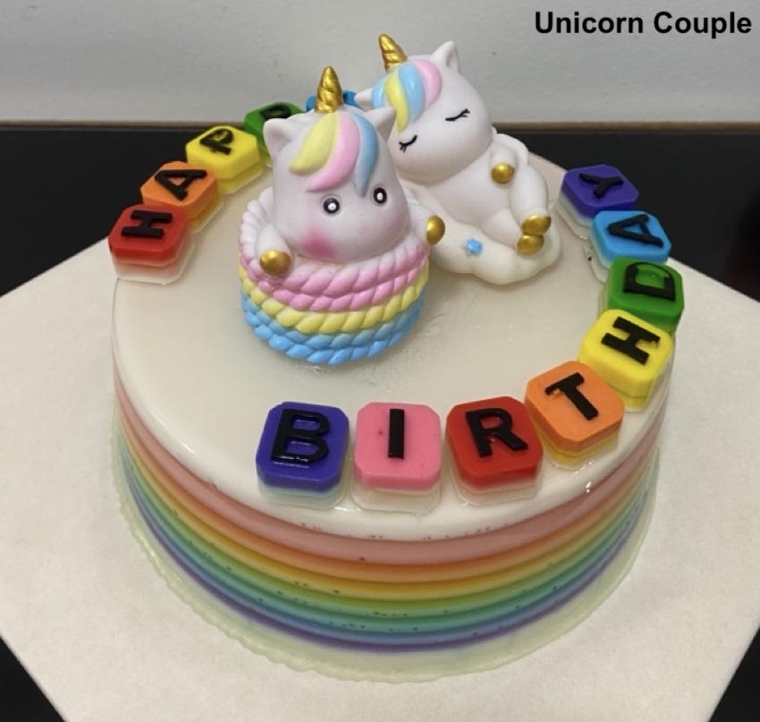 3. Cake Topper - Unicorn Couple
