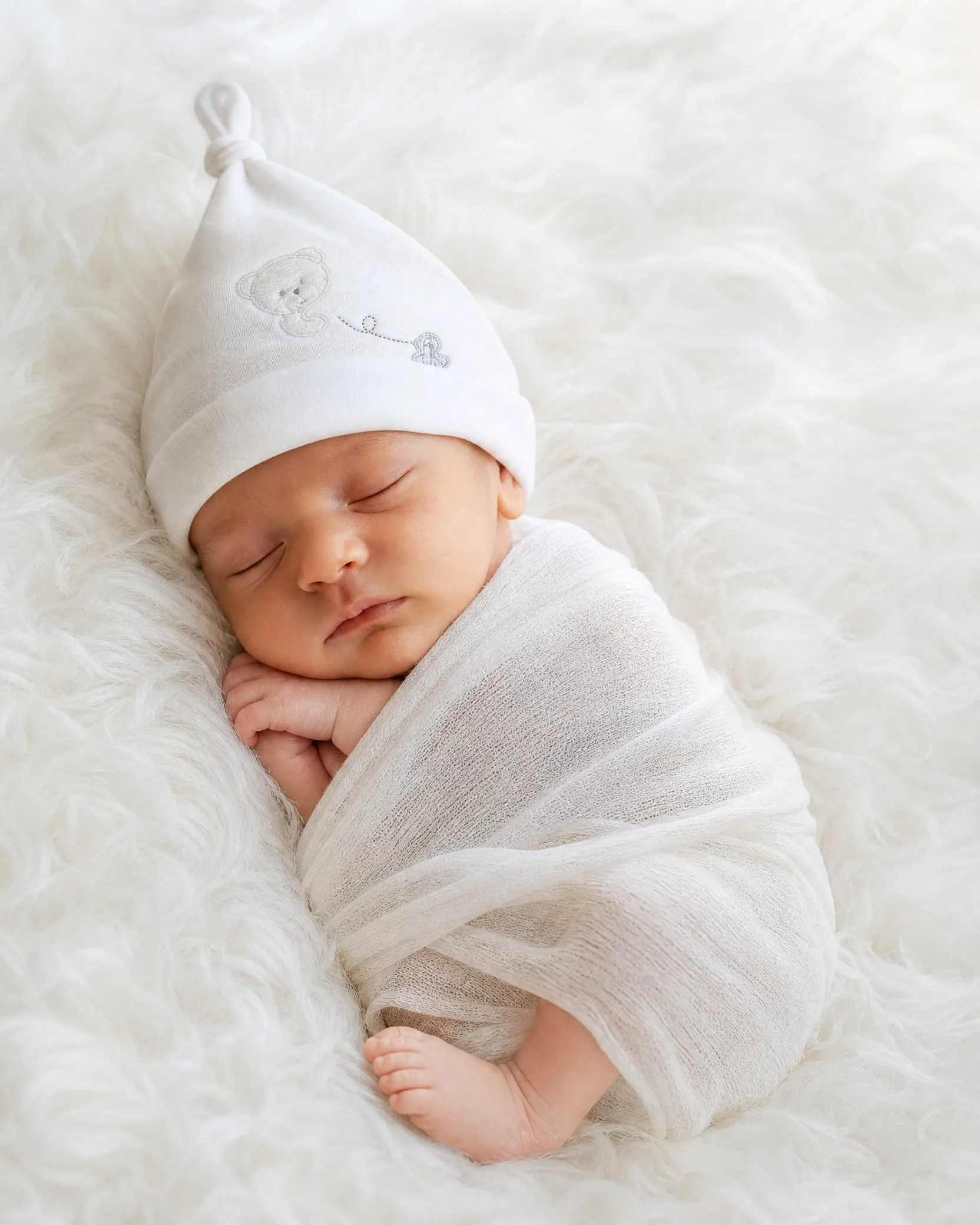 newborn_baby_wearing_hat_angle_2
