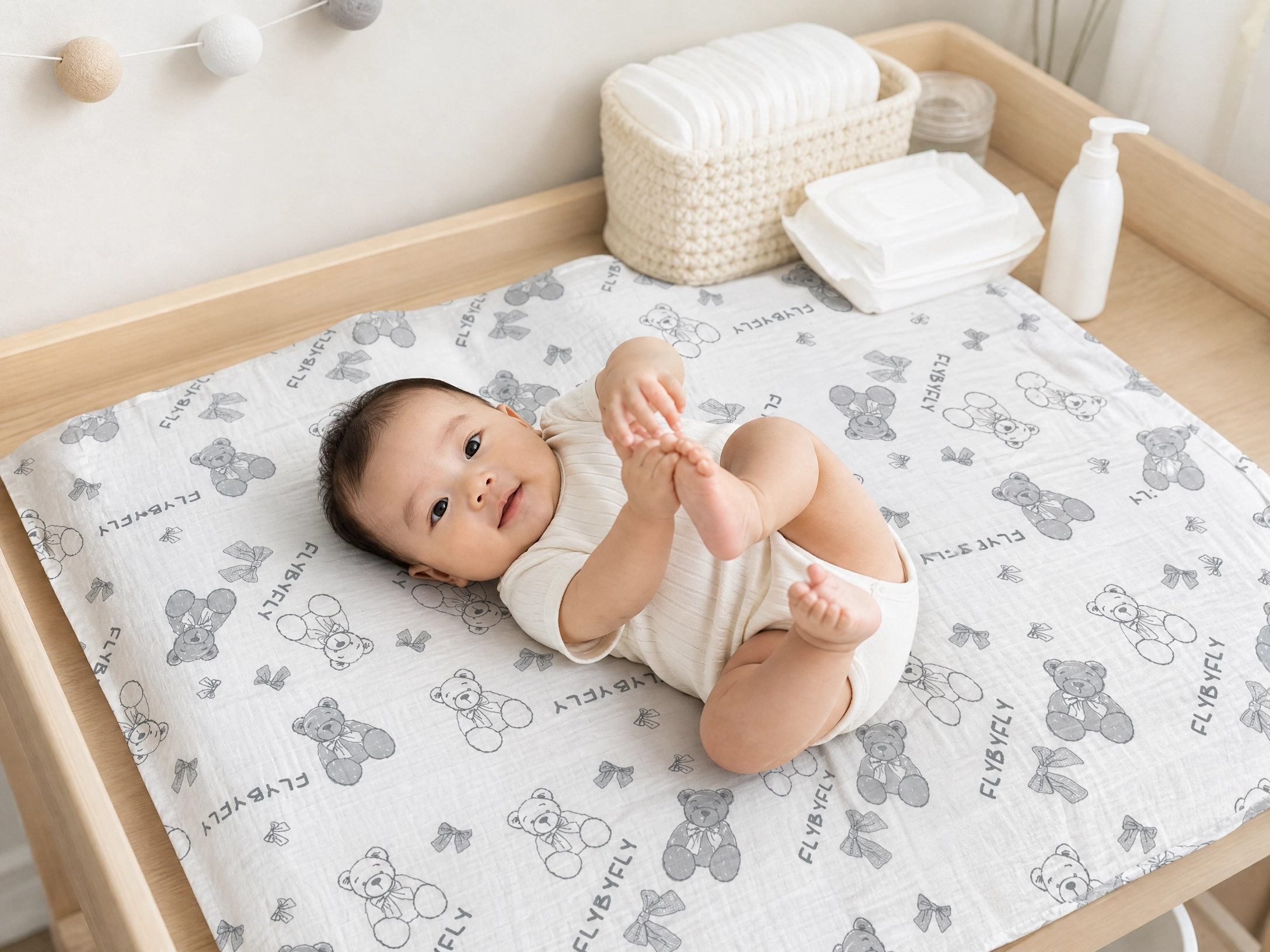 muslin_blanket_changing_mat_lifestyle