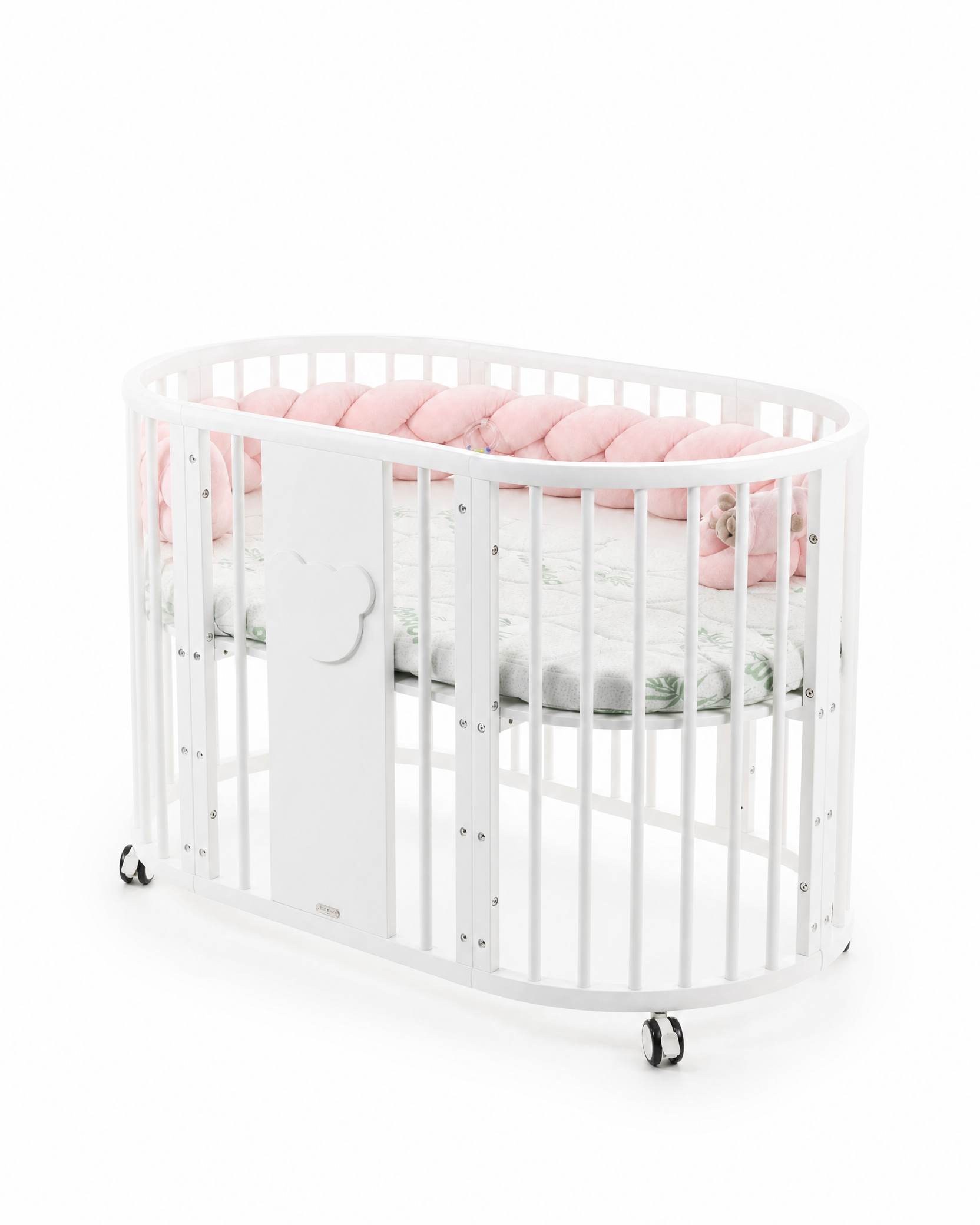 white_oval_crib_with_original_bumper