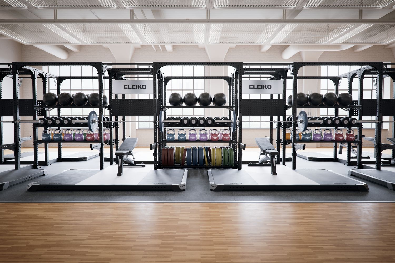 A commercial training floor with rows of Eleiko racks, benches and platforms