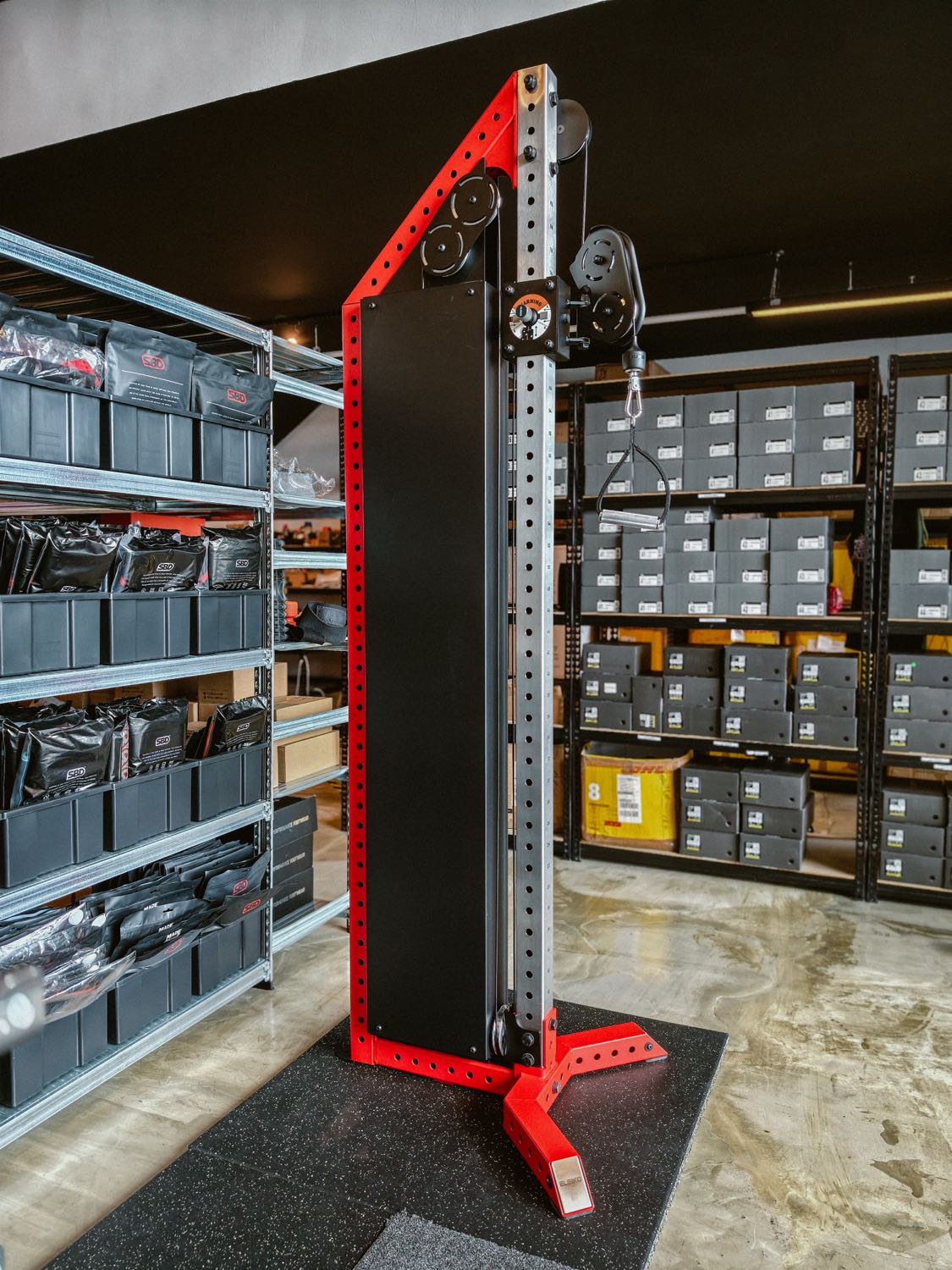 Red Eleiko cable column beside storage shelving at SBD Malaysia HQ
