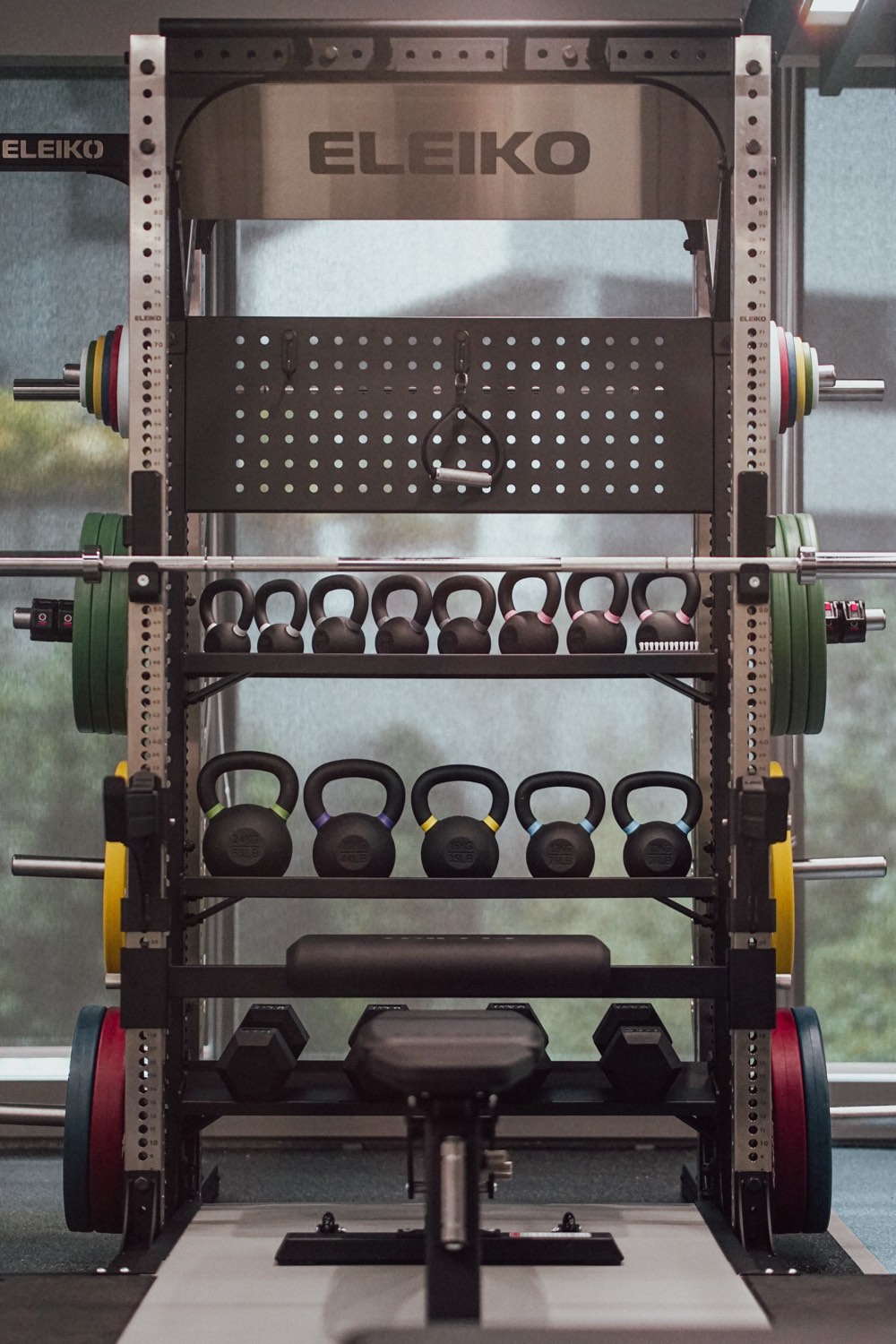 Eleiko rack with kettlebells and a bench at the alrajhi Bank Malaysia corporate gym