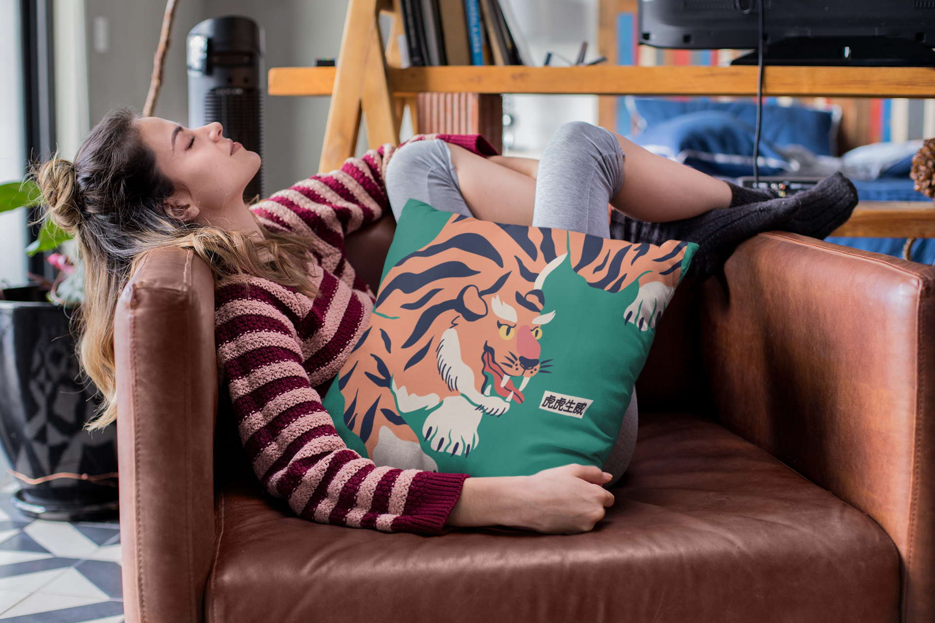 pillow-mockup-of-a-woman-relaxing-on-her-couch-23581.png